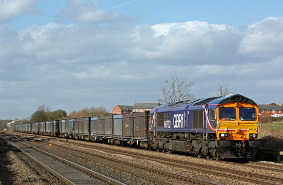 66732 at Astral Crossing, Cossington heading towards Syston East Junction on 10.3.11 with 4M82 1045 Drax GBRF - Hotchley Hill loaded Gypsum containers