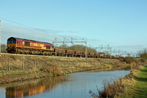 66181 alongside the Oxford Canal at Ansty heading towards Nuneaton on 6.3.11 with 6R05 Borne End  - Crewe via Wembley 20 MHA' s engineers train
