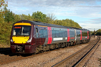 XC Class 170 No 170 114 crosses over at Syston South Junction on 12.10.11 with 0721 Stansted Airport - Birmingham New Street service