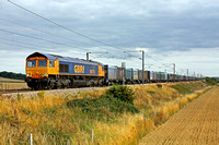 66715 at Frinkley Lane, Marston, ECML heading towards Newark on 22.8.11 with 4E19 Mountfield - Doncaster Down Decoy Sdgs empty Gypsum containers