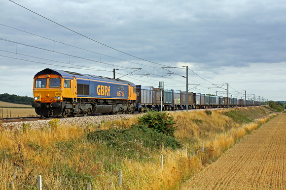 66715 at Frinkley Lane, Marston, ECML heading towards Newark on 22.8.11 with 4E19 Mountfield - Doncaster Down Decoy Sdgs empty Gypsum containers