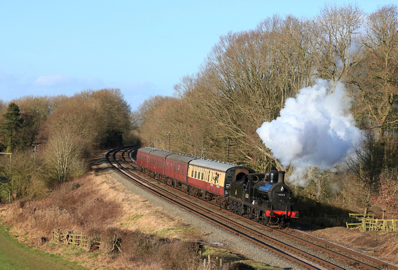 Guest loco L&Y A Class No. 52322 passes Kinchley Lane on 26.1.24 with 1315 Loughborough to Rothley Brook service after recessing at Quorn & Woodhouse sidings for 38 mins at GCR Winter Steam Gala 2024