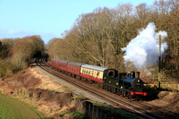 Guest loco L&Y A Class No. 52322 passes Kinchley Lane on 26.1.24 with 1315 Loughborough to Rothley Brook service after recessing at Quorn & Woodhouse sidings at GCR Winter Steam Gala 2024