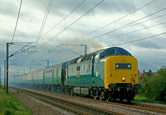With exhaust billowing out  55022 Royal Scots Grey thunders past Holme near Peterborough on 6.10.06 with 1Z55 Kings X - Edinburgh Autumn Highlander Charter operated by the Railway Touring Company