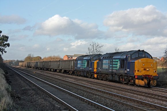 37688 and 37510 at Astoril Crossing, Cossington, MML heading towards Leicester on 3.2.11 with 6Z50 0925 Stockton - Sheerness loaded scrap wagons