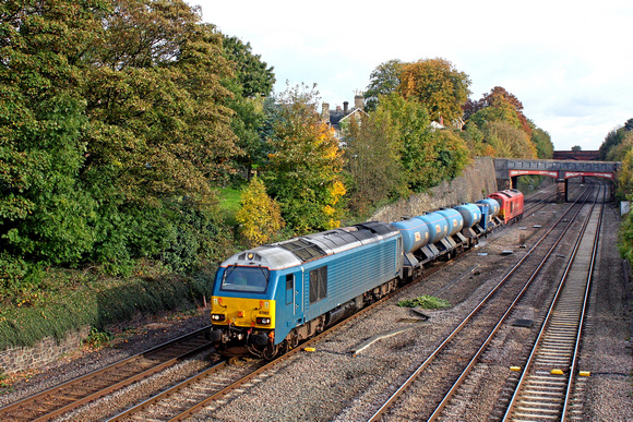 Arriva blue 67002  at an autumny  Barrow Upon Soar with 67018 'Keith Heller' in DB Schenker red livery at rear on 21.10.16 with 3J93 1153 West Hampstead North Jn. - Toton T.M.D. RHTT leaf spraying wor