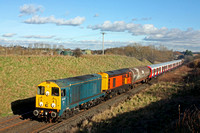 20107 in blue livery leads orange livery 20314 with  20118 & 20096 at rear through Copley's Brook Cutting west of Melton Mowbray on 10.2.16 with 7X09 1236 Old Dalby -West Ruislip Lul Dept S Stock move