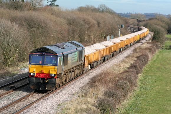 DRS 66425 on hire to Freightliner at Barrow Upon Trent heading towards Stenson Junction on 14.3.08 with 6U77 1348 Mountsorrel - Crewe Basford Hall  loaded ballast wagons