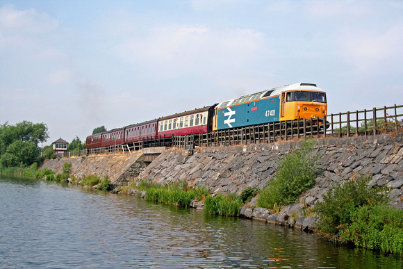 47401 'North Eastern' crosses  Butterley Reservoir on 21.7.06 working a MRC Charter from Hammersmith - The Riddings to help raise money for the Class 47 loco