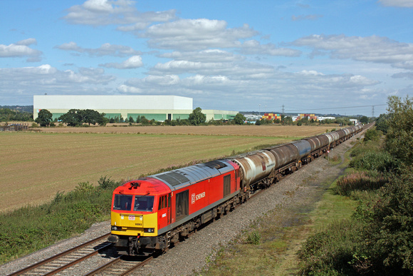 60063 in DB Schenker red livery crawls past Catholme near Wichnor Junction having just left Branston loop on 1.9.16 with 6M57 0715 Lindsey Oil Refinery - Kingsbury Oil Sdgs loaded bogie oil tanks