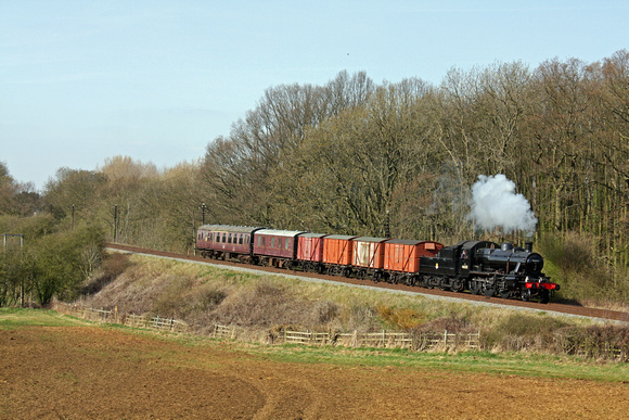 LMS Ivatt Class 2 2-6-0 No 46521 at Kinchley Lane on 1.4.12 with 1550 Loughborough - Rothley Brook demonstration vans freight at the  GCR  1960s Steam Gala