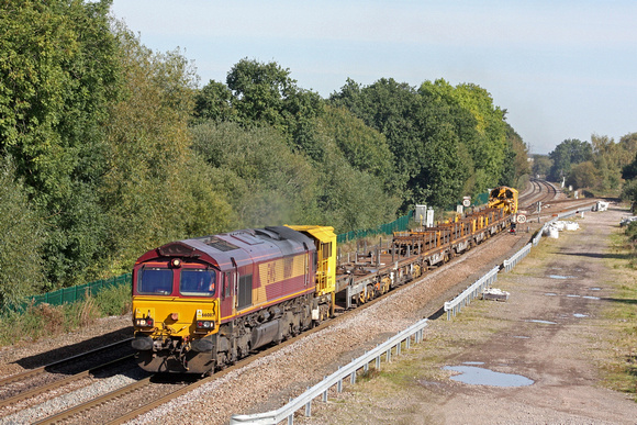 DB Cargo UK 66087 passes Stenson Junction on 3.10.16 with 6O01 1105 Belmont Down Reception - Eastleigh East Yard CWR train
