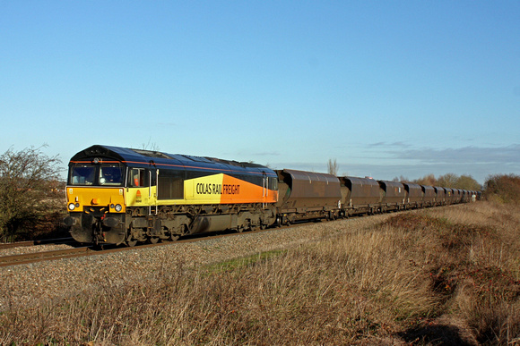 Colas 66848 is seen at Branston, Burton Upon Trent  on 3.12.14 with 4V30 0820 Ratcliffe Pst (Colas Rail) - Portbury Coal Tmnl (Colas) empty HAA coal hoppers
