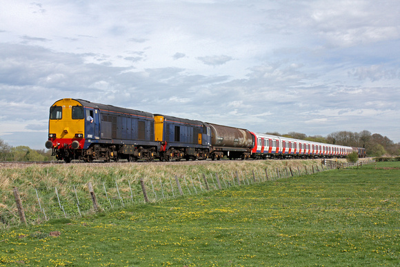 20302, 20301 tnt 20304, 20305 with Underground S Stock at Rearsby near Melton Mowbray on 6.4.11 with 8X09 1142 Old Dalby - Amersham after testing at Asfordby Test Centre