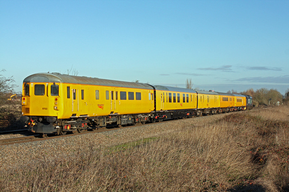 DBSO 9703  with 37409 pushing at the rear  is seen at Branston, Burton Upon Trent  on 3.12.14 with 3Z05 1024 Derby R.T.C.(Network Rail) - Bristol Temple Meads test train