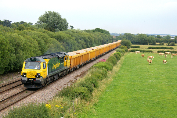 70010 is seen at rural Barrow Upon Trent heading towards Stenson Junction on 20.7.11 with 6C64  1348 Mountsorrel - Carlisle loaded Network Rail yellow IOA wagons