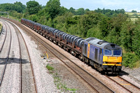 60044 in Mainline blue livery at Normanton on Soar near Loughborough on 8.7.2008 with 6M96 0548 Margam - Corby BSC loaded steel coil wagons