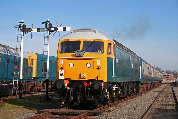 In new blue livery 47596 leaves Dereham Station on 16.3.07 with 0900 Dereham - Wymondham Abbey service on the Mid Norfolk Preserved Line