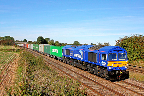 GBRf 66727 'Maritime One' in new eye catching  blue livery passes Thurmaston, MML heading towards Leicester on 3.10.16 with 4M20 1029 Felixstowe North - Birch Coppice well loaded liner