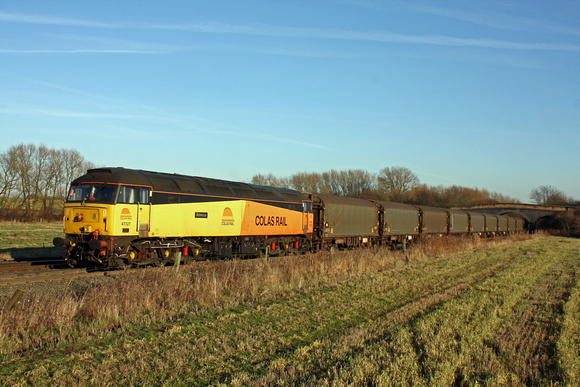 Colas Rail 47727'Rebecca' waits at Stenson Bubble, on the Castle Donington branch' on 16.1.12 with 6M08 1152 Boston Docks - Washwood Heath with loaded steel carriers running via Burton Upon Trent