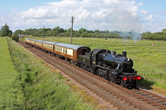LMS Ivatt Class 2 2-6-0 No 46521 at Woodthorpe, on 24.6.12 with 1645 Loughborough - Leicester North GCR service with the rake of Cromwell Pullman Car carriages