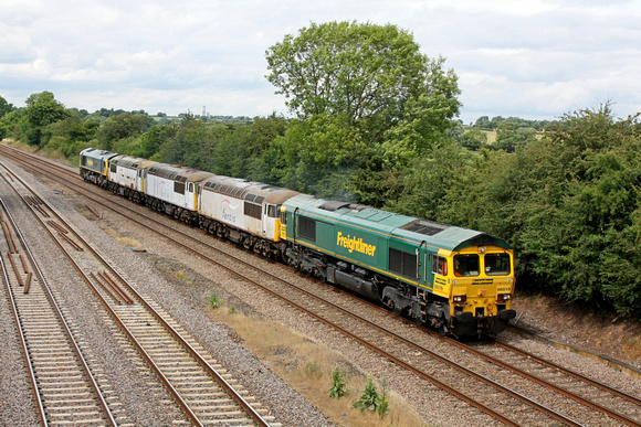 66519 leads grids 56038 + 56065 + 56104 in Fertis livery with 66957 at rear with 6Z57 1227 Burton Ot Wetmore Sidings - Leicester L.I.P. loco move by Freightliner