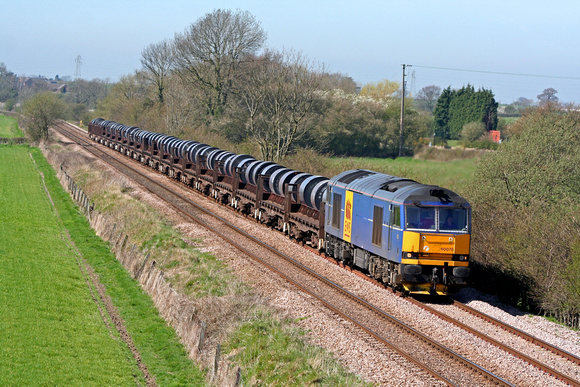 Mainline Blue Livery 60078 at Barrow Upon Trent heading towards Castle Donington  on 5.4.07 with 6M96 0548 Margam - Corby BSC loaded steel coil wagons