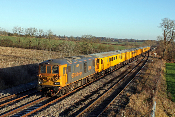 GBRf 73964 'Jeanette' with 73961 'Alison' at rear hurry past the loop at Kilby Bridge, MML heading towards Leicester on 4.12.16 with 3Q28 1113 Cricklewood No2 G L - Derby R.T.C.(Network Rail) load 9 t