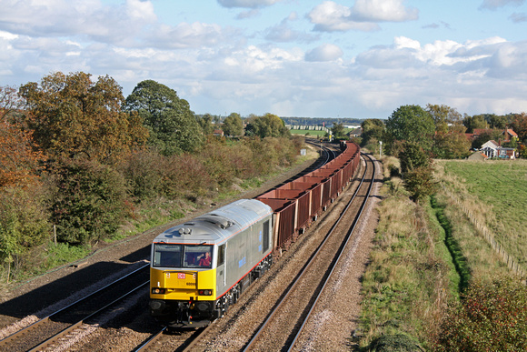 60099 in new TaTa livery at Melton Ross on 20.10.10 with 6T25 1329 Immingham- Santon loaded iron ore wagons