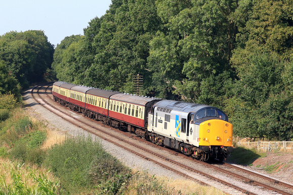 Class 37 No 37714 Cardiff Canton in BR Railfreight Grey (Metals Sector) livery passes Kinchley Lane on 6.9.24 with 1425 Loughborough to Leicester North