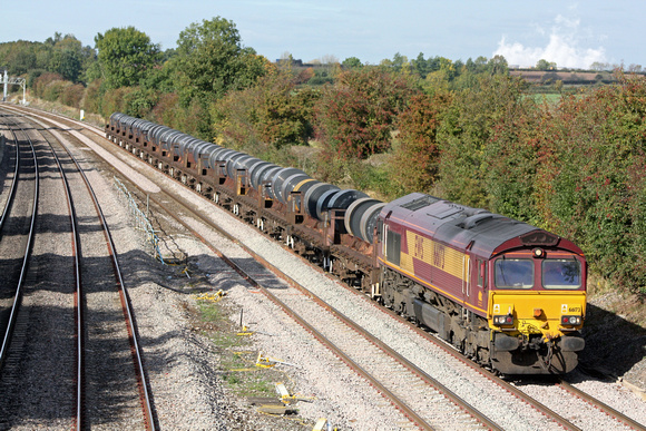 66173 at Normanton on Soar near Loughborough on 12.10 09 with 6M96 0548 Margam - Corby B.S.C. loaded steel coil wagons