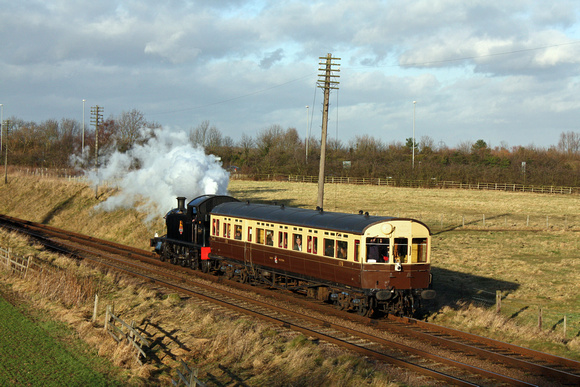 Visiting GWR Small Prairie 4575 Class No 5526 pushes Auto Coach W178 at Woodthorpe on 9.1.11 with 1415 Loughborough - Leicester North service at the special running weekend of 8 & 9 January 2011