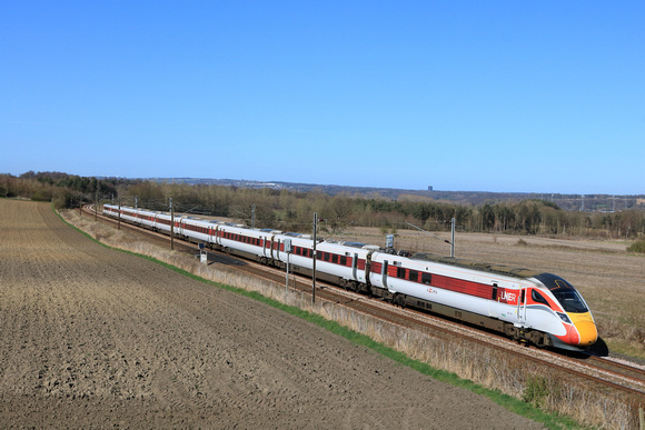 LNER Azuma Class 801 No 801201 races past Plawsworth near Durham, ECML on 6.4.25 with 1E18 1400 Edinburgh to London Kings Cross service