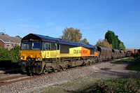 Colas Rail Freight 66848 at Branston near Burton Upon Trent on 30.10.13 with 4V30 0807 Ratcliffe Power Station - Portbury Coal Terminal empty coal hoppers in lovely autumn sun and colours