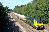 70014  seen at Sutton Bonnington heading towards Loughborough on 5.9.12 with 6L87 1237 Earles Sdgs - West Thurrock loaded PCA cement tanks.