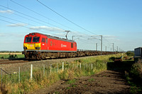 DB Schenker livery 92016 at Broad Fen Lane, Claypole, heading towards Newark,  ECML on 12.9.12 with 4E32 1152 Dollands Moor - Scunthorpe empty steel carriers