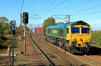 Freightliner 66506 'Crewe Regeneration' approaches Manniongtree Station on 11.10.22 with 4L89 0409 Crewe Bas Hall S.S.M. to Felixstowe North F.L.T. Liner