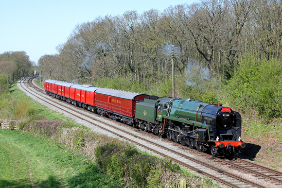 9F No 92214 has had an identity swap commemorating 92220 'Evening Star' seen at Kinchley Lane on 18.4.15 with 1445 Loughborough - Swithland TPO service at the GCR Railways at Work Weekend