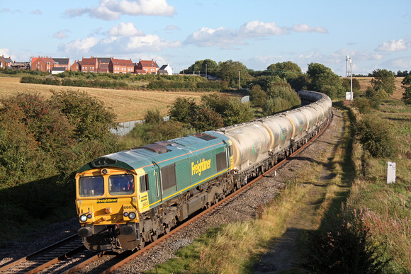 66620 at Wistow MML heading towards Leicester on 18.9.12 with 6M92 1318 West Thurrock - Earles Sdgs empty LaFarge cement tanks
