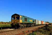 Freightliner Class 66 No 66517 passes Morston Hall near Trimley on the Felixstowe Branch line on 18.10.22 with4E56 1546 Felixstowe North F.L.T. to Doncaster Ept (F'liners) Intermodal