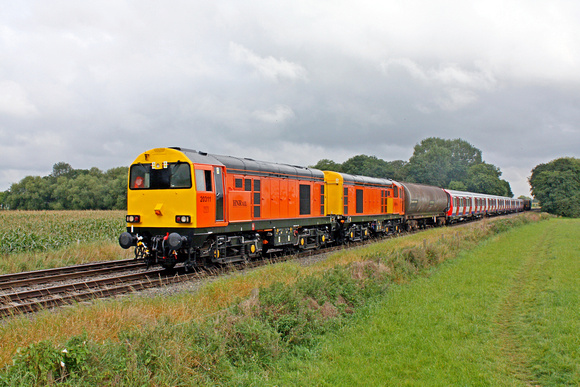 HNRC orange choppers 20311+314 top n tailing blue 20107+096 on 26.9.12 at East Goscote near Syston East Jn  with 7X09 1142 Old Dalby to Amersham S stock move