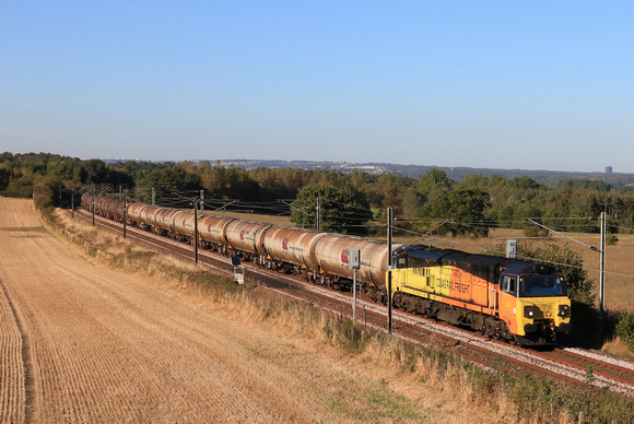 Colas Rail Freight Class 70 No 70813 races past Plawsworth near Durham, ECML on 17.9.24 with 6D43 1541 Jarrow Prax to Lindsey Oil Refinery Colas empty bogie tanks