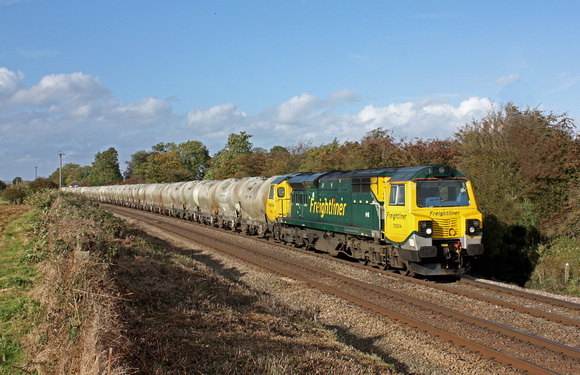 70004'The Coal Industry Society'  seen at Ashwell near Oakham (Rutland) on 17.10.12 with  6L87  1237 Earles Sdgs - West Thurrock loaded PCA cement tanks