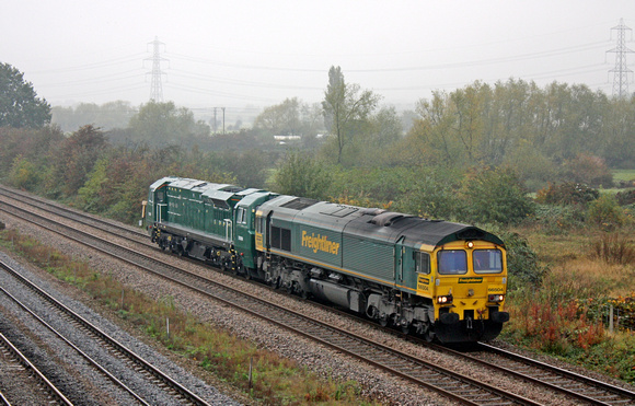 66504 drags Turkish Railways 70099 in absymal light at Loughborough on 23.10.12 with delayed 0Z62 1014 Crewe Basford Hall - Brush Traction, Loughborough for testing
