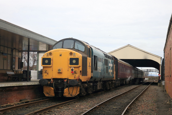 Class 37 No 37025 'Inverness TMD'  brings up the rear of 1230 Bo'ness to Manuel service on 12.2.23 at the Bo'Ness and Kinneil Railway. On the front is NCB Fife area, No 19