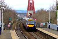 ScotRail Class 170 No's 170401 & 170394 enter Dalmeny Station on 12.2.23 with 2G02 1320 Glenrothes with Thornton to Edinburgh service having crossed the Forth Rail bridge {SMB}