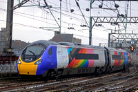 In the pouring rain Avanti West Coast Pride Pendolino No 390119 enters Glasgow Central Station on 11.2.23 with 1S42 0730 London Euston to Glasgow Central service