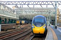 Glasgow Central Staion on 11.2.23. From l to r Scotrail 156506, 156504 & 156511 2J32 1117 to East Kilbride, ScotRail 380104 2N32 1105 to Neilston, Avanti West Coast 390129 1M12 1136 to London Euston s