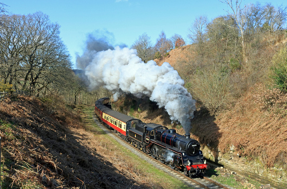 On the first day of the NYMR 2023 timetable BR Standard 4MT No. 76079 chugs round the curve at Beck Hole on 27.3.23 with 1410 Whitby to Pickering service