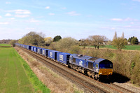 DRS Class 66 No 66433 passes Barrow upon Trent heading towards Castle Donington on 3.4.23 with 4E49 1038 Daventry Drs (Tesco) to Doncaster Iport Tesco containers